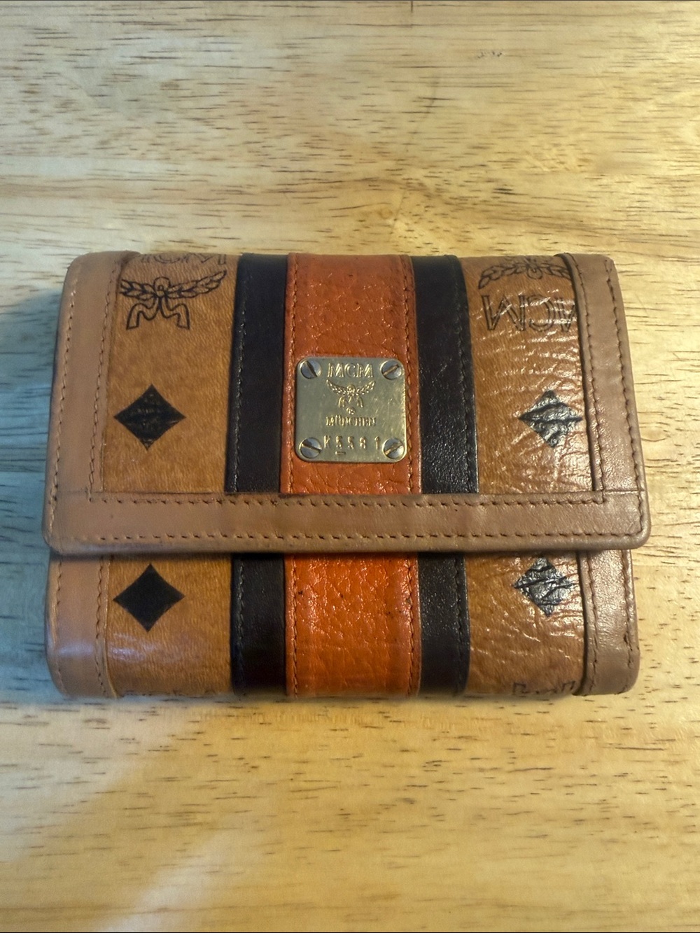 MCM Striped Tri-Fold Wallet in Tan, Orange and Black